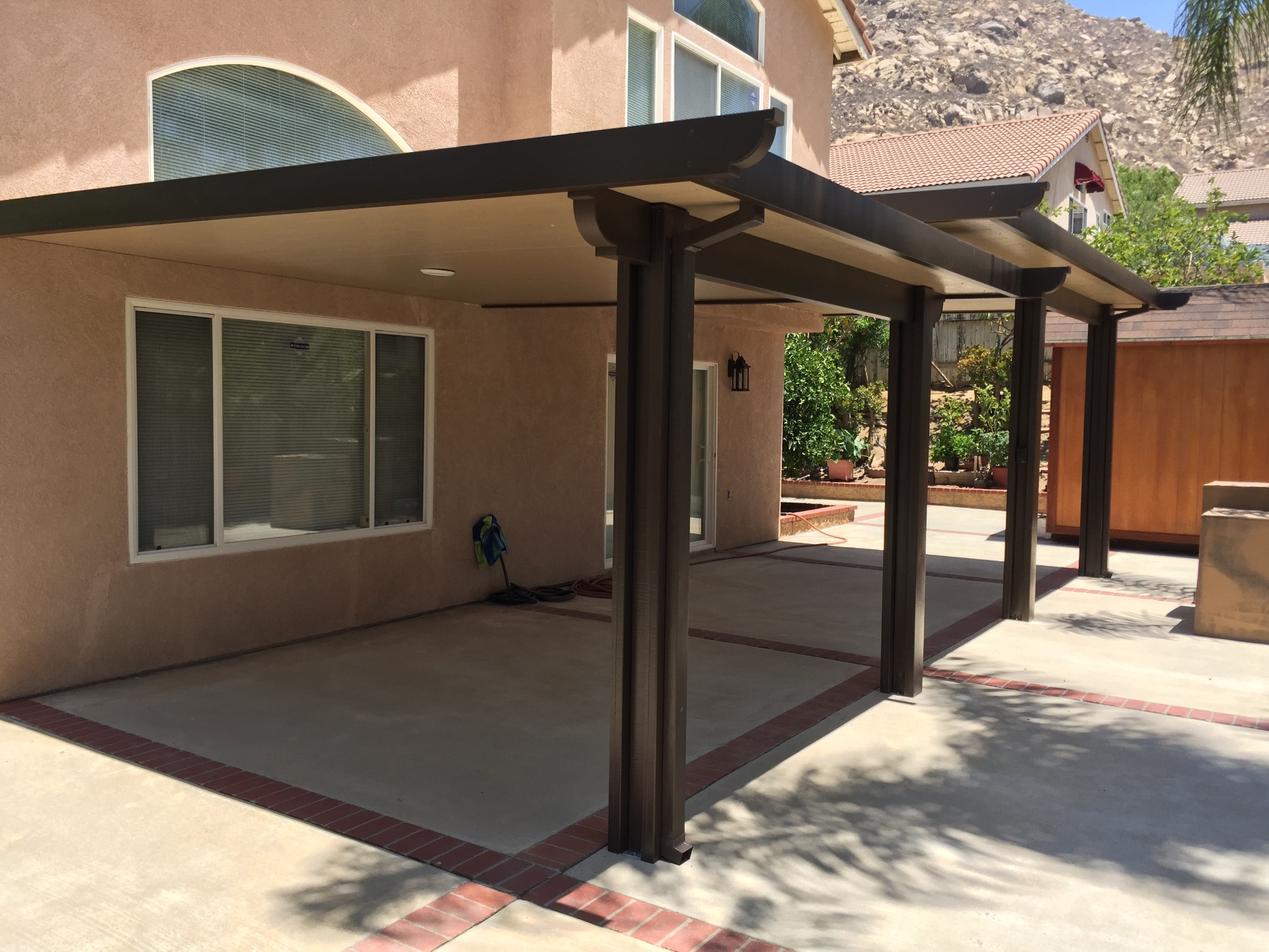 Beautiful sunroom and patio cover at golden hour