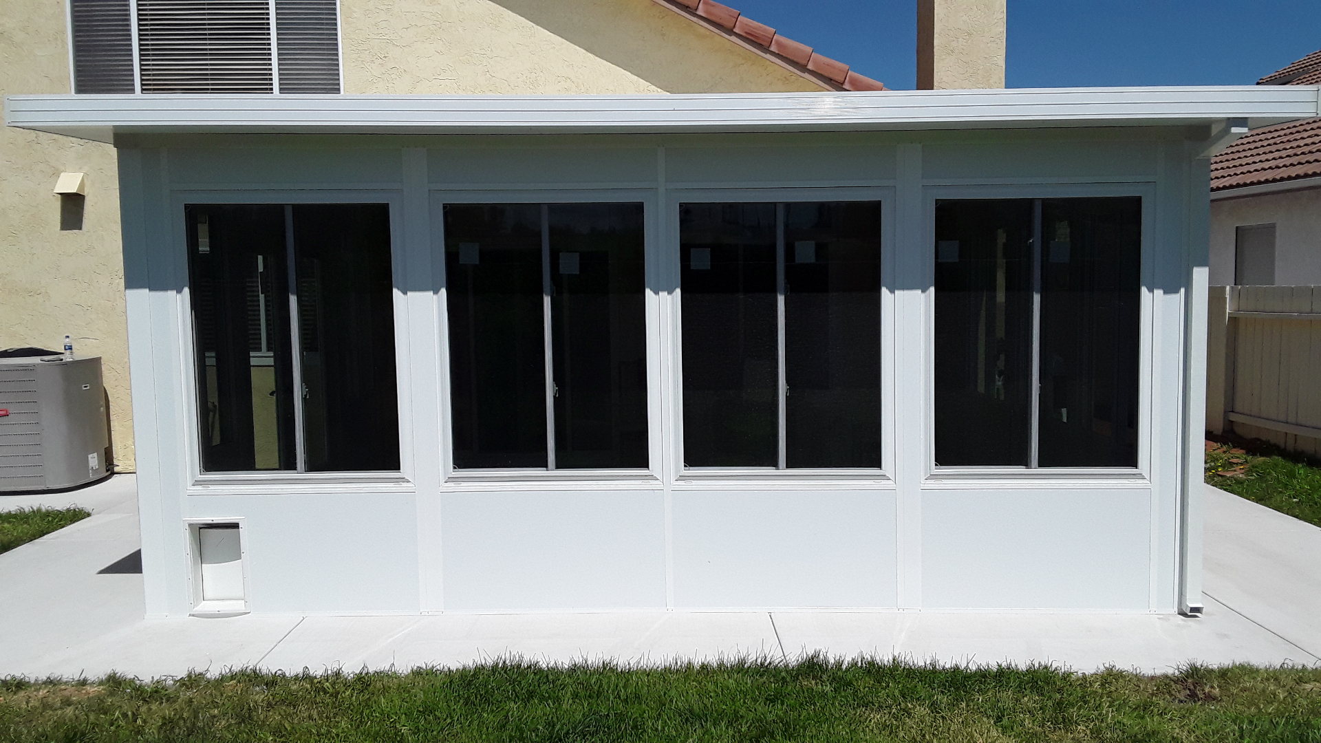 Sunroom Exterior with Sliding Windows
