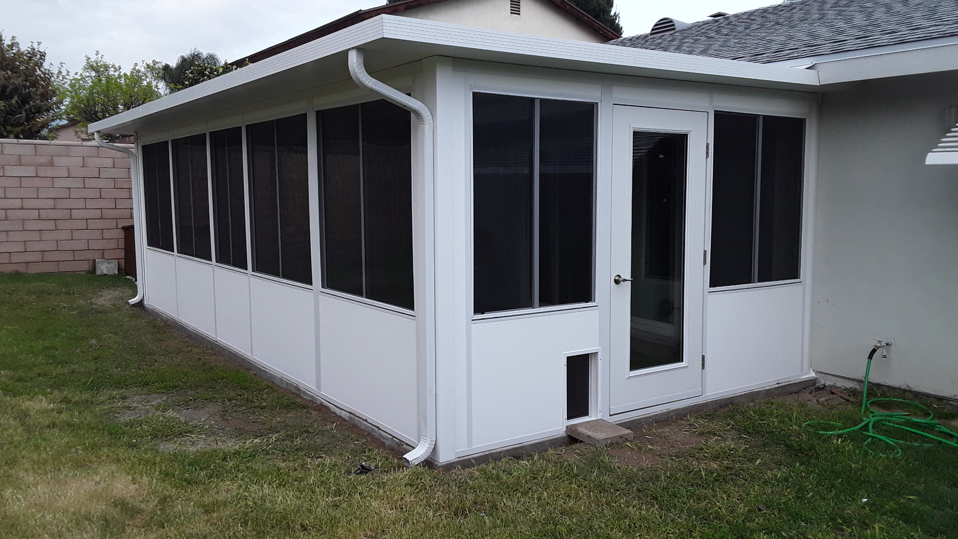 Enclosed Sunroom with Pet Door
