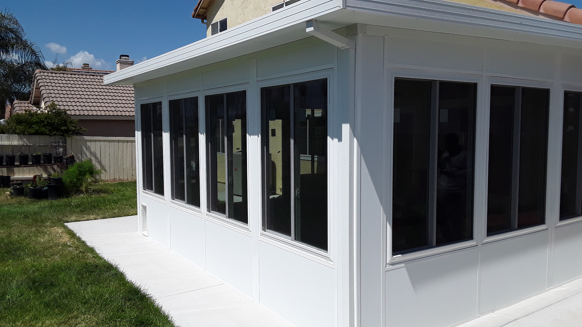 Wraparound Sunroom with Sliding Windows