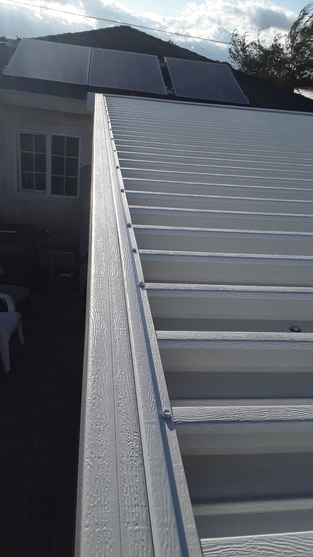 Patio Cover with Integrated Rain Gutter